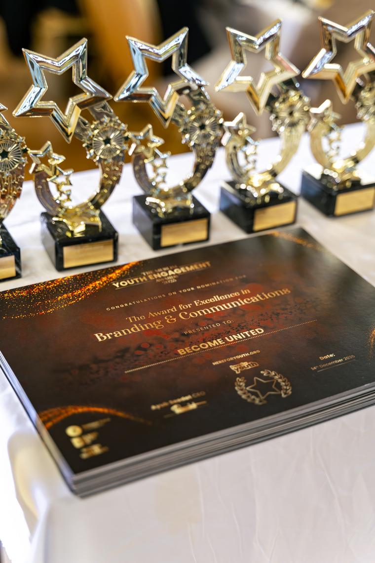 Star trophies resting on a table before the presentations.